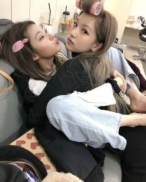 Photo : Sana with her legs Up ans Mina